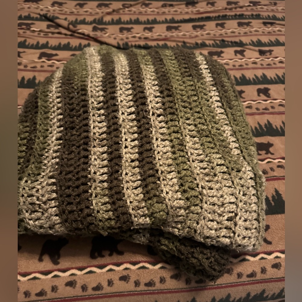 Hand made soft camo themed throw blanket. Made of soft wool.